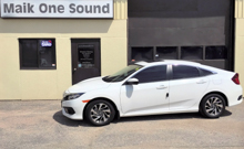 White 2017 Honda Civic with professional window tint